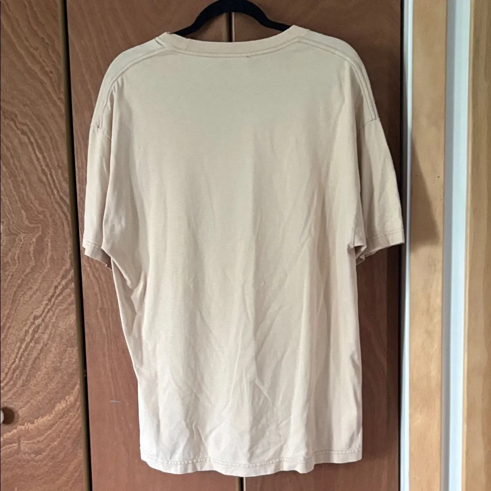 Dr. Seuss Cream T‑Shirt with Yellow, Green, Red, and Blue Fish